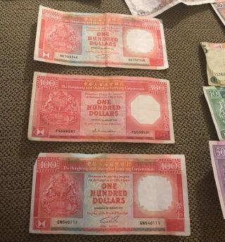 Group of foreign coins plus paper money HONG KONG 100 Dollars 2