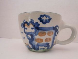 Vintage M.  A.  Hadley Hand Painted Pottery Tea Cup.  Cow " The End " Blue & Grey