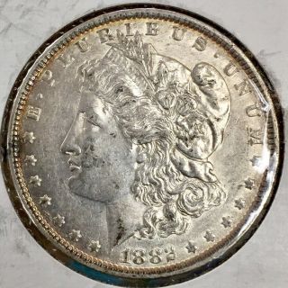 1882 O Morgan Silver Dollar With Light Golden Rim Toning