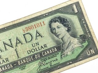 1954 Devils Face Canada 1 One Dollar La Prefix Circulated Canadian Banknote M464