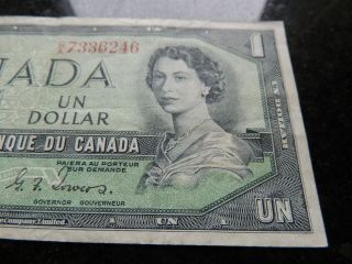 1954 BANK OF CANADA $1 ONE DOLLAR DEVILS FACE G/A 7336246 COYNE TOWERS 2