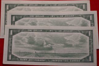 3 - Uncirculated 1954 Canada Consecutive Serial Numbers $1 Notes 2
