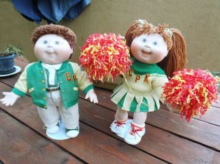 Two Vintage Cabbage Patch Porcelain Dolls With Stands