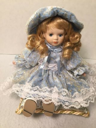 Animated Wind Up Music Box Porcelain Doll Sitting On Pillow Song Plays Fur Elise