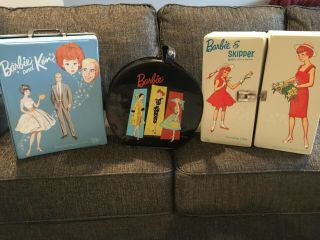 Three Barbie Cases With Clothes For Barbie,  Ken,  & Skipper
