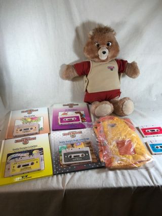 Teddy Ruxpin 1985 Bear With 4 Books,  6 Tapes & Rain Jacket - Eyes Not