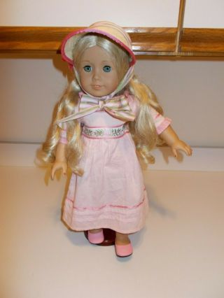 American Girl Doll Caroline Med.  Skin Blond Hair Blue Eyes,  Outfit - Near