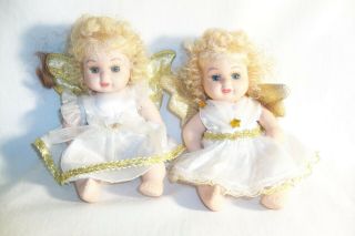 2 Porcelain Angel Dolls Golden Wings