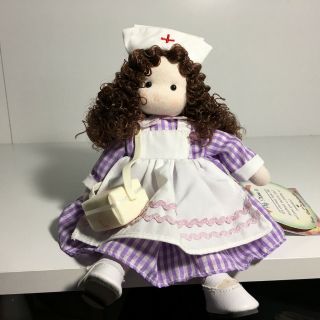 Green Tree Musical Dolls - Nurse Brunette With Purple Dress