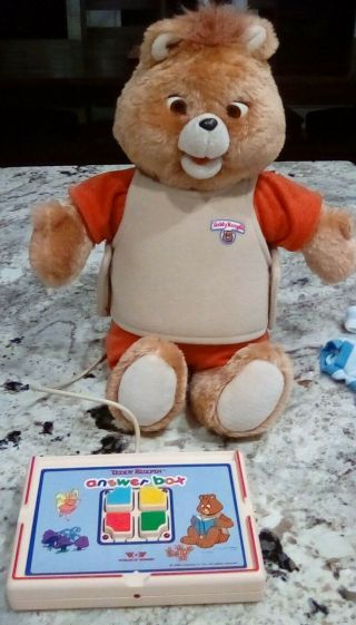 Teddy Ruxpin With Clothes,  Tapes,  And Books In