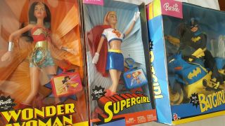 Barbie DC comic heros.  Batgirl,  Wonder Woman and supergirl.  NRFB 2