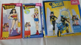 Barbie DC comic heros.  Batgirl,  Wonder Woman and supergirl.  NRFB 3