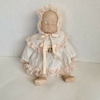 Porcelain Sleeping Baby Doll With White Outfit & Bonnet With Pink Trim 9 "