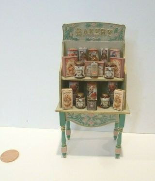 Miniature Bakery Display Shelf With Teas,  Jam And Honey Containers