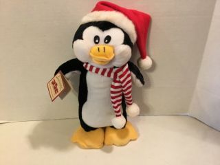 Christmas Penguin Sings ‘sleigh Ride’ & Hops To Music