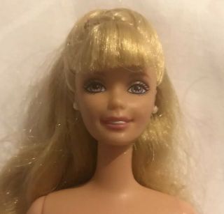 Barbie Doll With Blonde Hair And Bangs