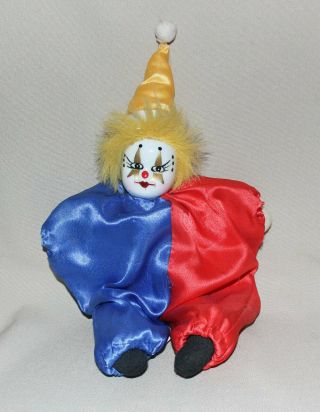 Clown Doll Porcelain Head Fabric Body Blue Red Yellow 7 ½”