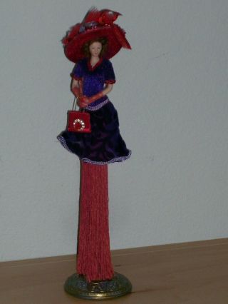 Popular Imports Putting On The Ritz Red Hat Tassle Doll Purple Dress Red Hat