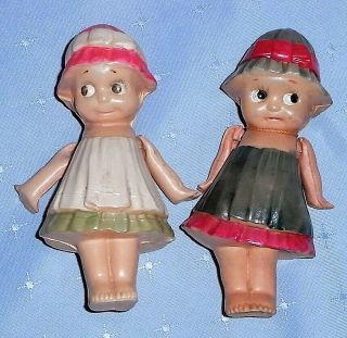 Vintage Celluloid Kewpie Dolls with Molded Clothes,  Hats and Dog 2