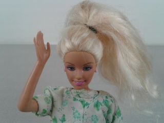 1999 Barbie doll with long blonde hair and pink earrings made in Indonesia 2
