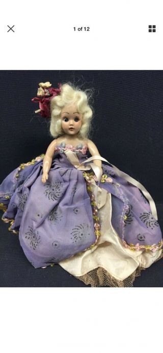 Adorable Plastic 8 Inch Doll With Googly Eyes.  Purple Gown Sweetheart Pants