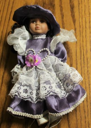 Excite Porcelain Doll Dressed In Purple 8 " No Box