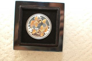 2012 Feng Shui Koi $2 Silver.  999 1 Oz Coin