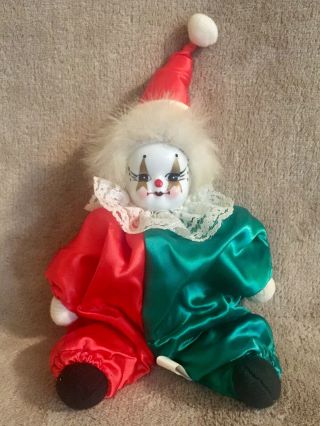 Miniature Sitting Porcelain Clown Doll - 8”