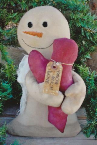Primitive Snowman Pattern Holding A Large Heart
