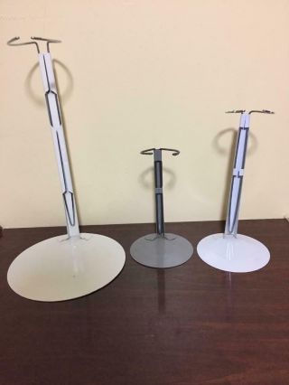 3 Doll Stands 1 Large 13 " Tall Expands To 23 " Med.  1 9 " Expands To 16 " Small 7 "