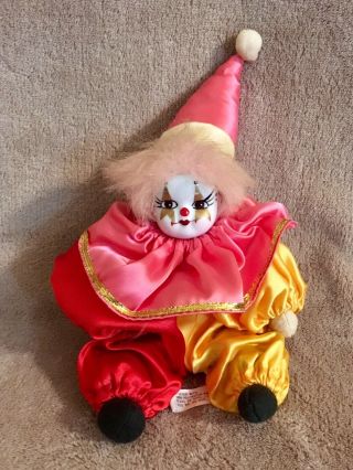 Miniature Sitting Porcelain Clown Doll - 7”
