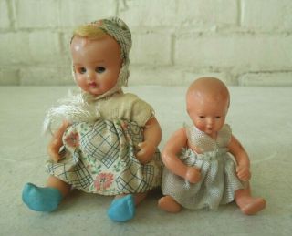 2 Vintage Celluloid Sleep Eye Dolls W/ Jointed Arms & Legs W/ Clothes